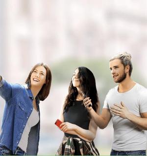 a group of three people standing next to each other