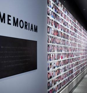 a wall in a room with a wall of movies