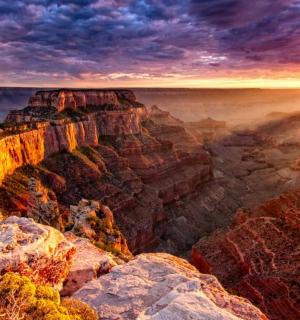 a view of the grand canyon at sunset
