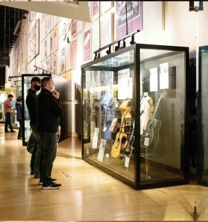 a group of people standing in a shopping mall
