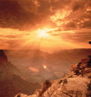 a view of the grand canyon at sunset