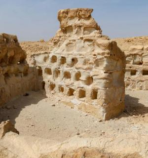 a building in the middle of a desert