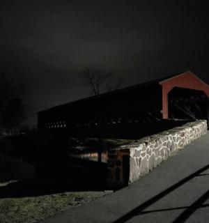 a building is lit up at night with