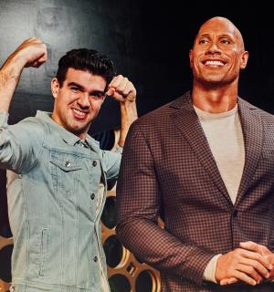 two men are standing next to each other