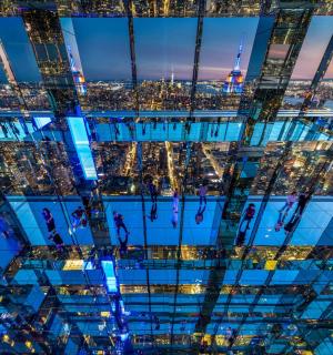 a view of the city from the top of a skyscraper