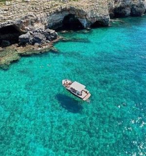 a boat in the middle of a large body of water
