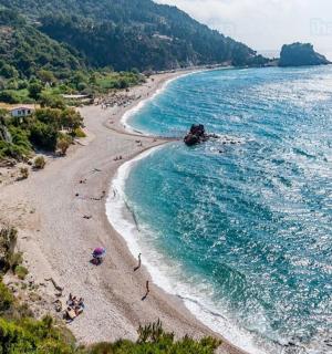 an aerial view of a beach with people on it