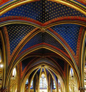 an ornate ceiling of a large building with blue and gold