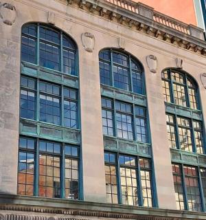 a large building with many windows on the side of it