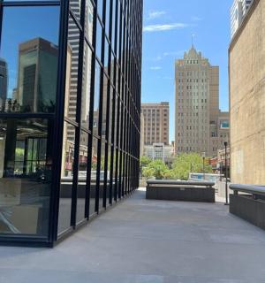 a view of a city from a building with glass windows