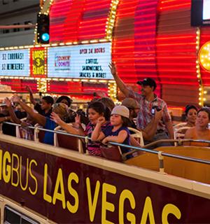 a crowd of people sitting in a train