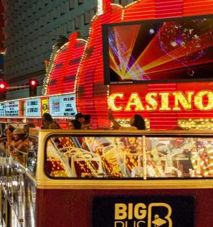 a double decker bus with a buffet of food
