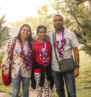 a man and two women posing for a picture