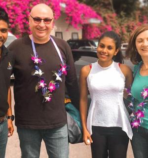 a group of people posing for a picture