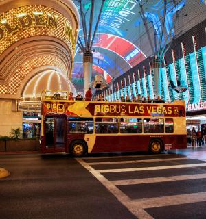 a double decker bus parked in a shopping mall