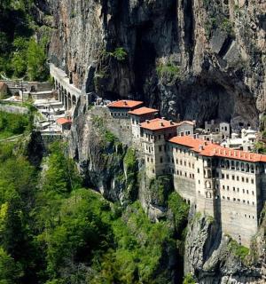 a building on the side of a mountain