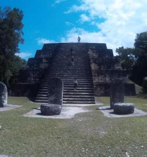 a person standing on top of a pyramid