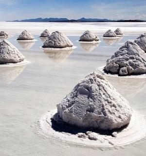 a group of sand castles in the water
