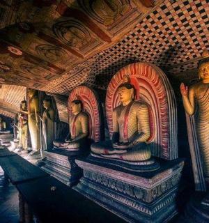 a painting of three statues in a room