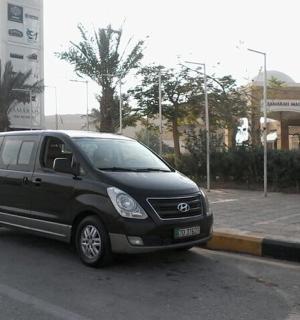 a black van parked in a parking lot