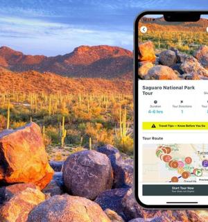 一部手机放在一些岩石顶上