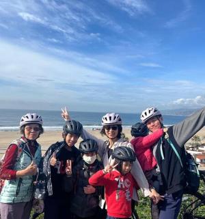 a group of people wearing helmets posing for a picture