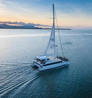a boat in the middle of a large body of water