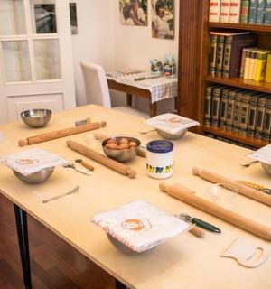 a table with baseball equipment on it in a library
