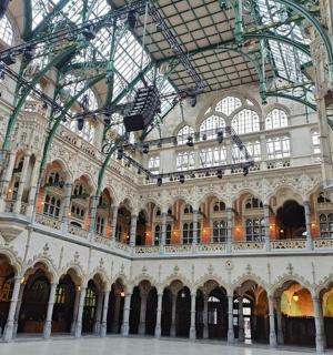a large building with a lot of windows and ceilings