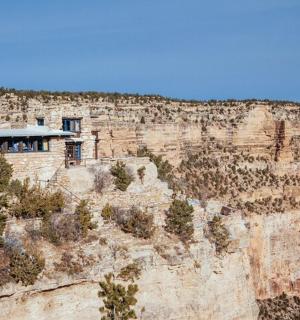 a building on the side of a cliff