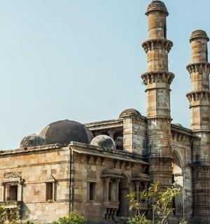 an old building with domes and mosques on it