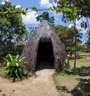 a small building in the middle of a park