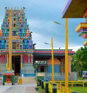a large building with a large tower in front of it