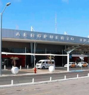 a building with cars parked in a parking lot