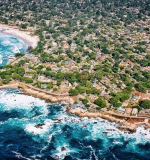 an aerial view of a small island in the ocean
