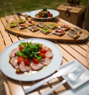 two plates of food on a wooden table