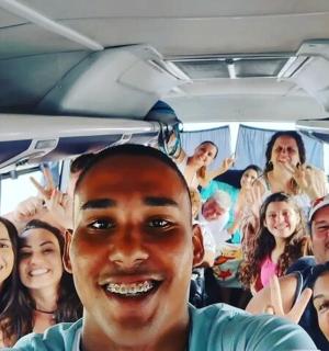 a group of people riding on a bus