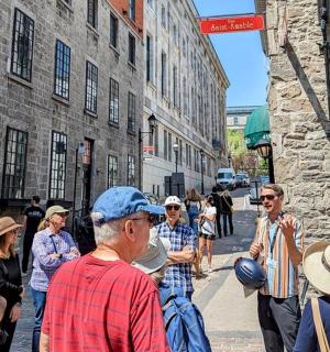 a group of people walking down a street