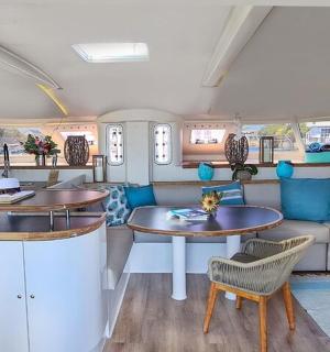 a kitchen and living room of a caravan