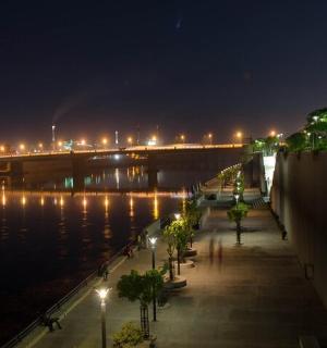 a bridge over a body of water at night