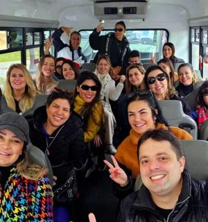 a group of people sitting in a bus