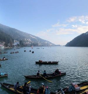 a group of people in boats on a lake