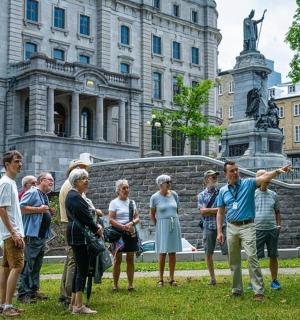 a group of people standing in front of a building
