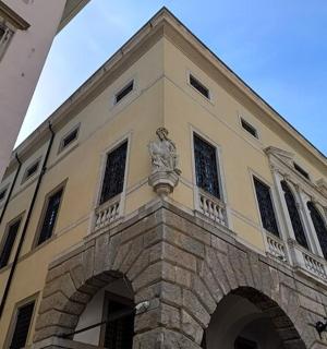 a building with a statue on the top of it