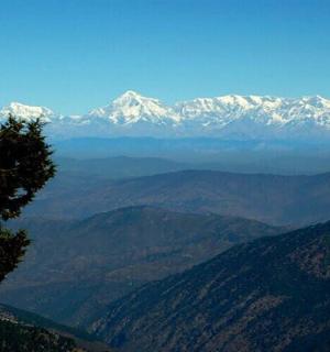 a view of a mountain range with snow covered mountains