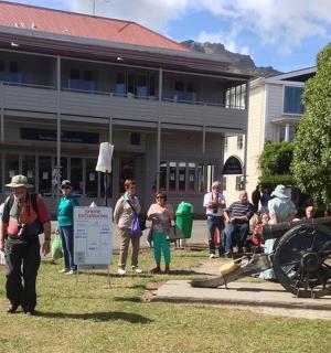 a group of people standing in front of a building