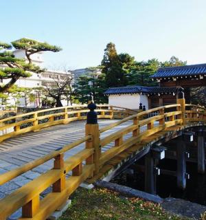 a wooden bridge over a body of water