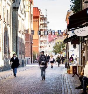 a group of people walking down a street