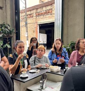 a group of people sitting at a table