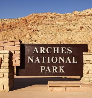 a sign at the entrance to a national park